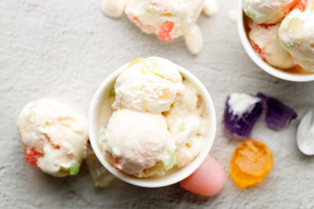 yogurt and jelly ice cream in a white bowl. Small bowls of yogurt and jelly ice cream flavor on...