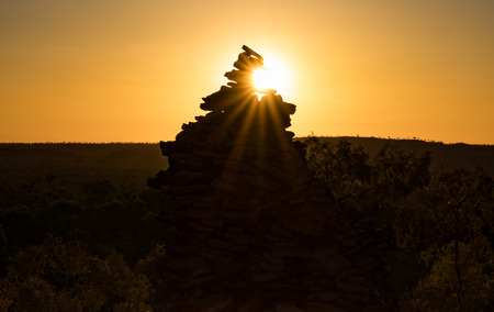 Sunset on cairn in outback australia, backgroundの写真素材
