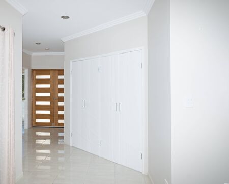 Inside of new house with tiled floor and built-in cupboardの写真素材