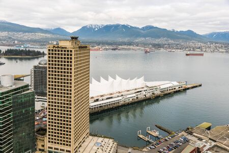 Vancouver, Canada - January 28, 2017: Vancouver city with Canada Place and mountains in the backgroundのeditorial素材