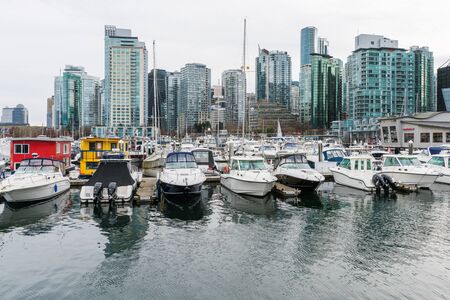 Vancouver, Canada - January 28, 2017: Vancouver city skyline with boats in foregroundのeditorial素材