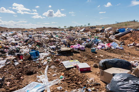 Piles of household refuse in dumping area at local tipのeditorial素材