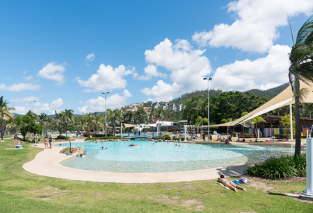Airlie Beach, Australia November 5, 2017: Tourists and locals enjoy the Airlie Beach Lagoon on a warm summer dayのeditorial素材