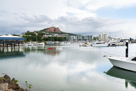 Boats in Townsville Marina with Castle Hill in backgroundの写真素材