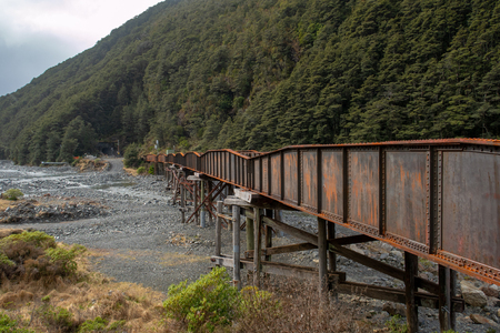 Steel Railway bridge over the river at Arthurs Pass, Canterbury, New Zealandの写真素材