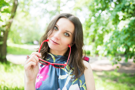 Happy young woman outdoorsの写真素材