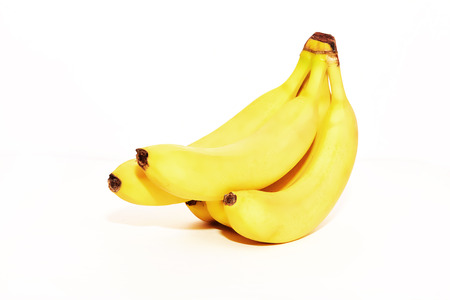 fresh bananas isolated on a white backgroundの写真素材