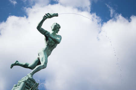 Bronze fountain statue on the main square in Brusselsのeditorial素材