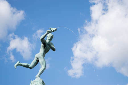 Bronze fountain statue on the main square in Brusselsのeditorial素材