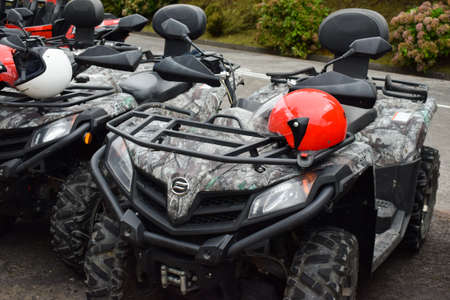 Quad bikes without people are in a row, ready for ride.のeditorial素材