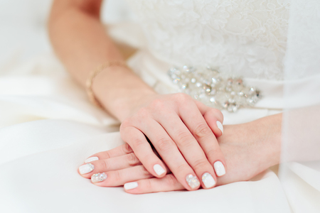 the bride's hand with a manicure 1の写真素材