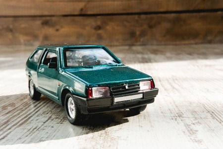 small model of old russian car close up on wooden backgroundの写真素材