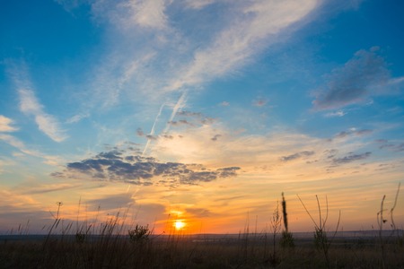 very beautiful summer sunset with bright colors of the skyの写真素材