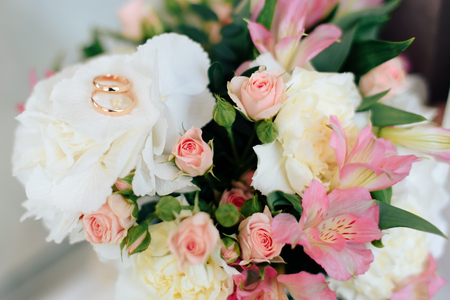 beautiful wedding bouquet with gold rings, bridal accessories 1の写真素材
