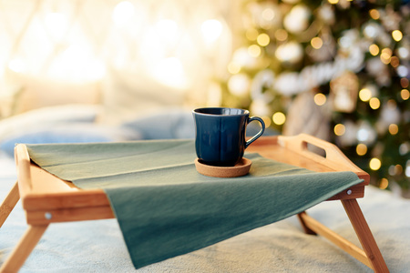 cups with tea on the background of the Christmas tree 1