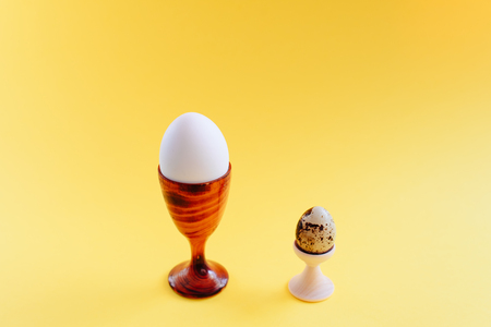Easter eggs on yellow backgroundの写真素材