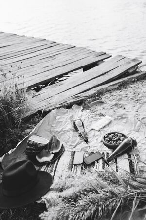 river picnic with lemonade and nuts and watermelon