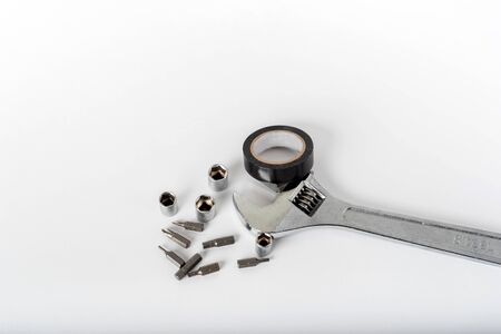 adjustable spanner and other tools on a white background 1