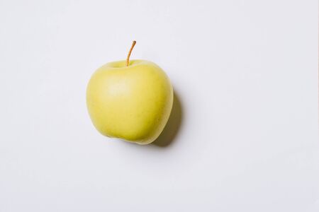 Green Apple on a white backgroundの写真素材