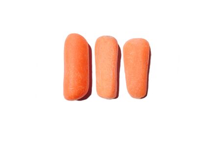 Orange carrots on a white backgroundの写真素材