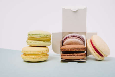 Several colorful macaroon cakes on a colored background 1の写真素材