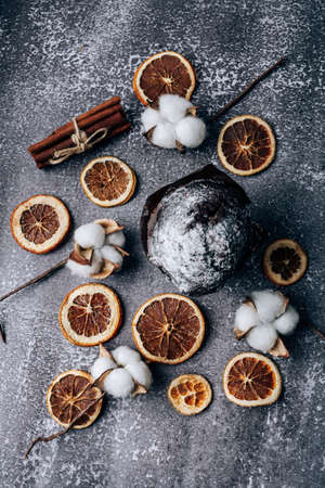 Christmas composition with chocolate cupcake on a dark backgroundの写真素材