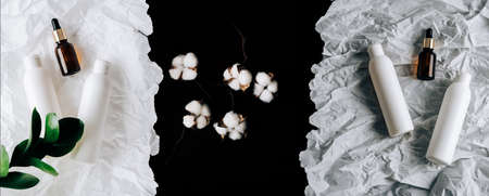 bottles of cosmetics on white crumpled paperの写真素材
