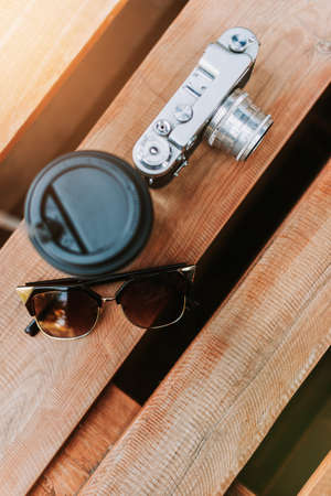 Vintage camera on a wooden surface close-up