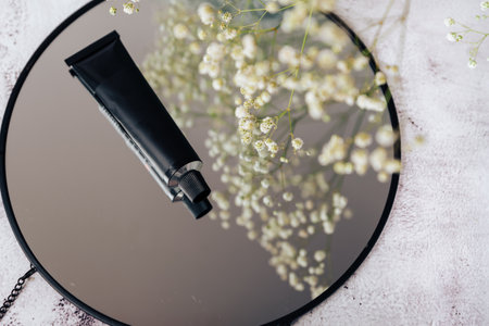 Black tubes with cosmetic cream, health careの写真素材