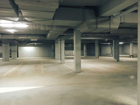 empty lighted underground parking lotの写真素材