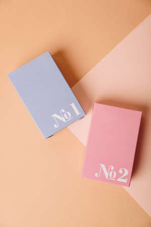 Colored boxes with a number on a colored surface 1