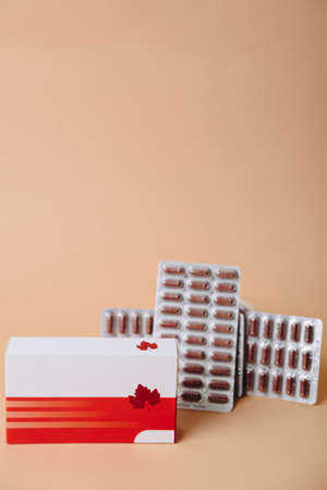 Tablets with packaging close-up on a colored background 1の写真素材