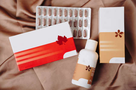 Tablets with packaging close-up on a colored background 1の写真素材