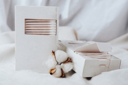 Cotton swabs in a white box and white cotton 1の写真素材