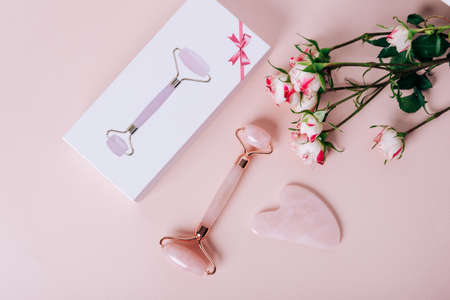 Face massager on pink background 1の写真素材
