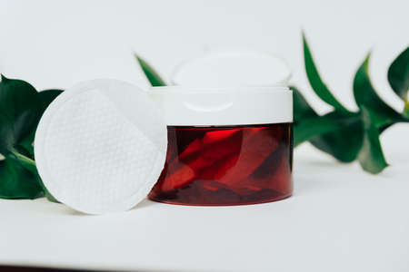 The girl's hand takes out a cotton pad from the box 1の写真素材