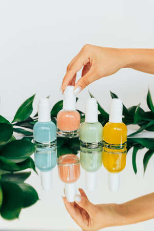 Tubes of colored nail polish close-upの写真素材