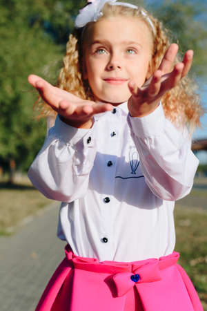 Children with candy in their handsの写真素材