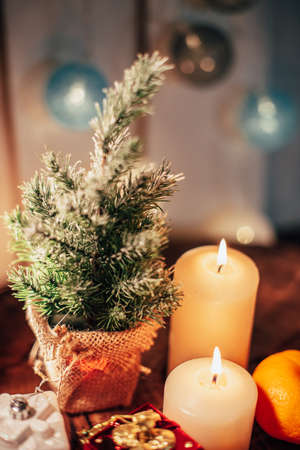Christmas decor with candles and giftsの写真素材
