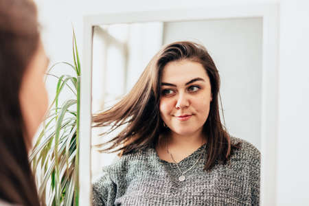Studio photo of a beautiful adult girlの写真素材