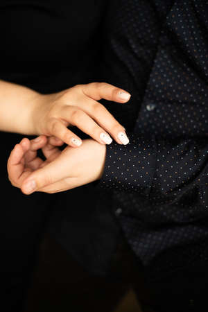 The hand of a man and a woman in close-up 1の写真素材