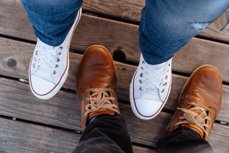 Feet on a wooden plank surface 1の写真素材