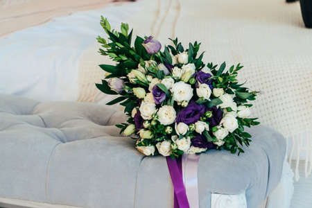 Bouquet of flowers with roses and green leavesの写真素材
