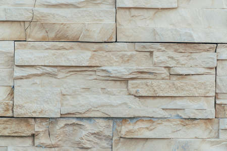 Beige background made of artificial stoneの写真素材