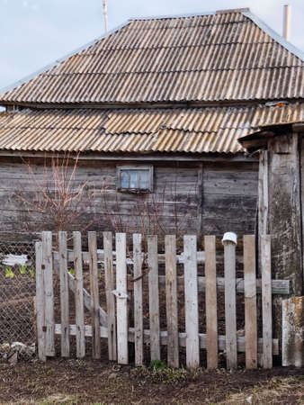 Old dilapidated retro house in sunny weatherの写真素材