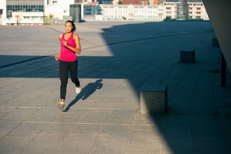 Running alone on sunny day stock photo