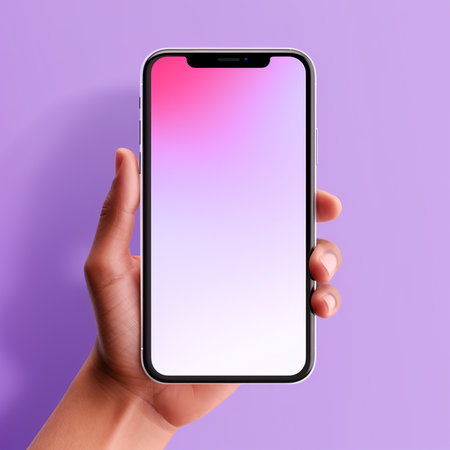 female hand holding smartphone with blank screen on purple background, mockupの素材