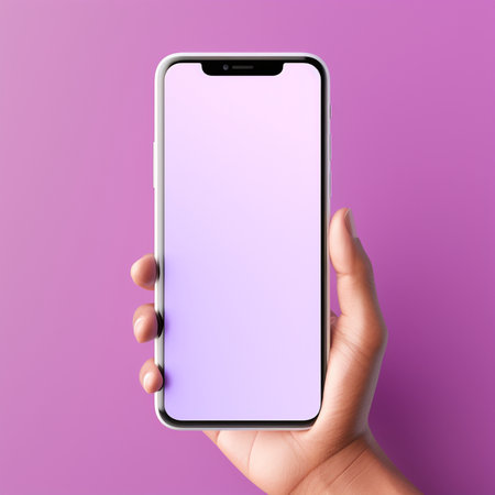 female hand holding smartphone with blank screen on purple background, mockupの素材