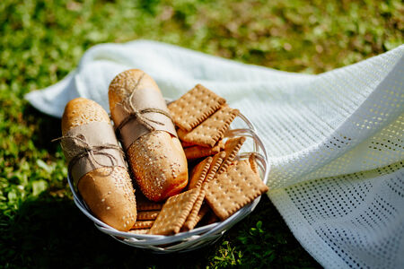 bakery and cookies on the plate with green grass background in country styleの写真素材