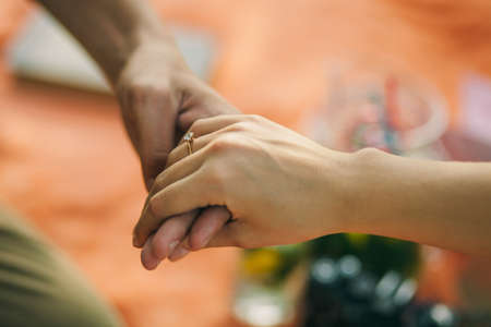 engagement ring proposal in hand close upの写真素材
